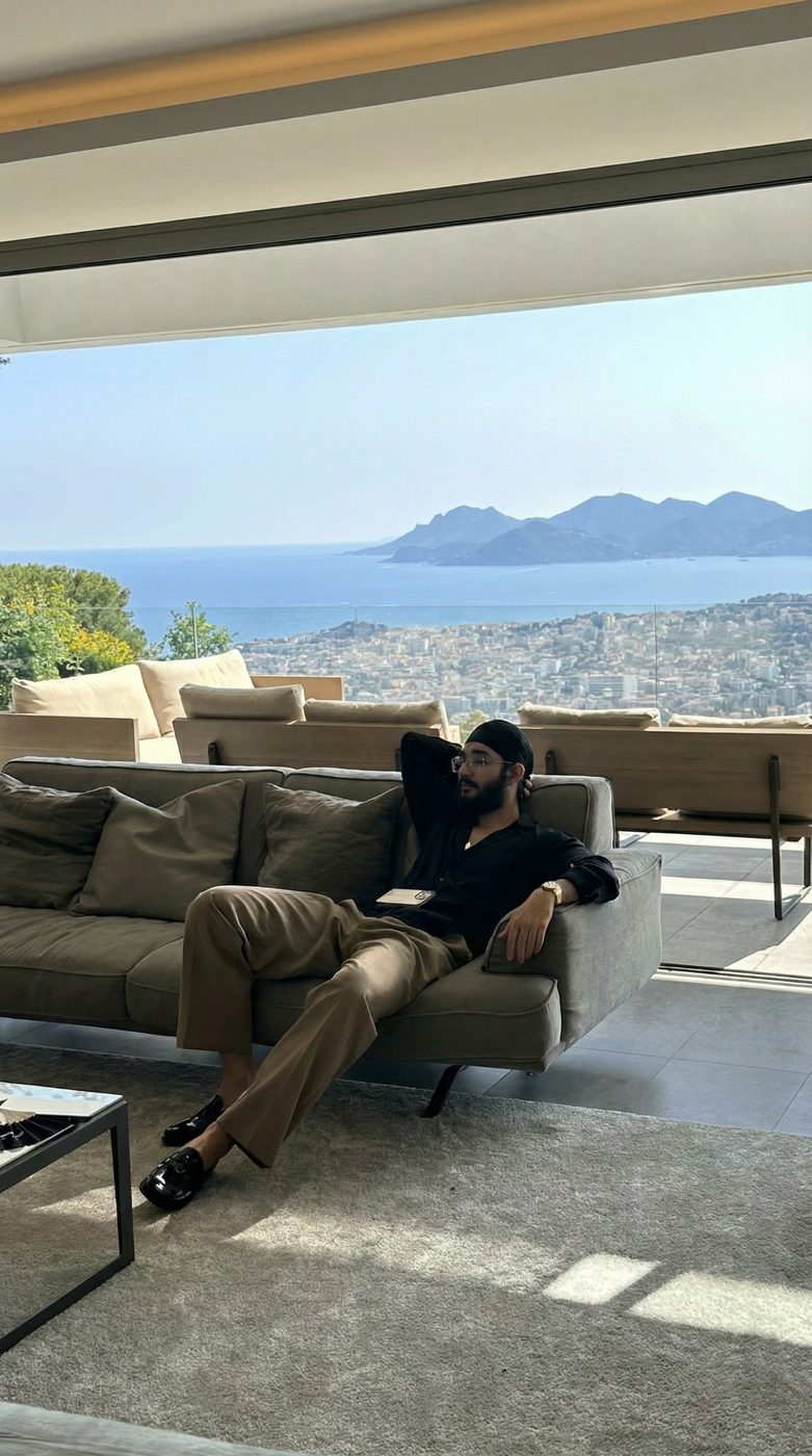 Jaidev Bhogal relaxing in a villa with a view of the sea and mountains